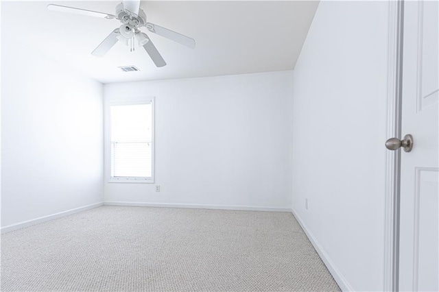 3277 Wyesham Cir, Duluth, GA 30096 - spare room featuring light carpet, baseboards, and a ceiling fan