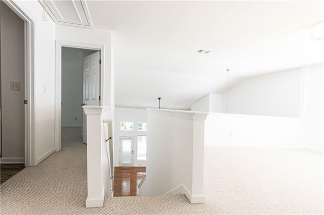 3277 Wyesham Cir, Duluth, GA 30096 - hallway with carpet, an upstairs landing, baseboards, attic access, and vaulted ceiling