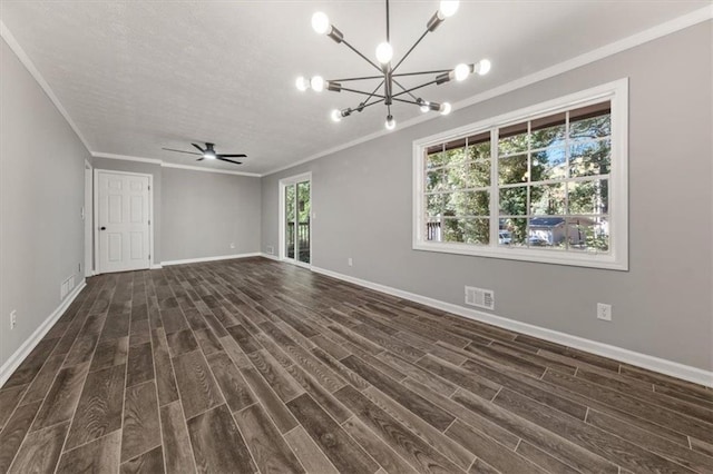 unfurnished living room featuring a wealth of natural light, dark hardwood / wood-style flooring, and ceiling fan with notable chandelier