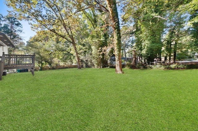 view of yard featuring a deck