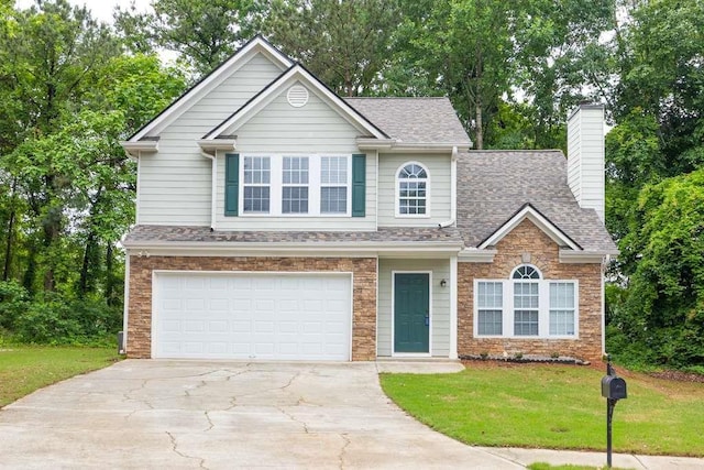 3514 Willgrove Way, Duluth, GA 30096 - view of front of house with concrete driveway, an attached garage, a front lawn, roof with shingles, and a chimney