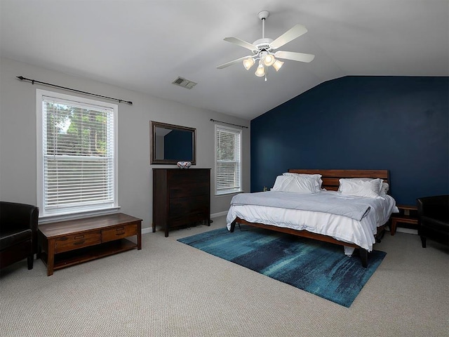 1535 Justine Way SE, Mableton, GA 30126 - carpeted bedroom featuring lofted ceiling, multiple windows, ceiling fan, and baseboards