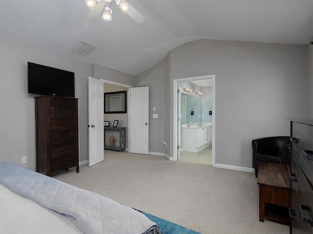 1535 Justine Way SE, Mableton, GA 30126 - carpeted bedroom featuring vaulted ceiling, baseboards, a sink, and connected bathroom