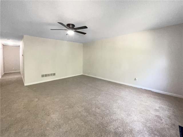 unfurnished room featuring a textured ceiling and ceiling fan