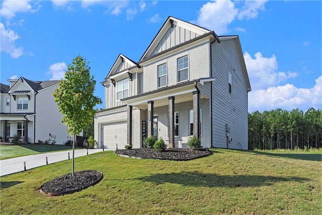 front facade with a garage and a front yard