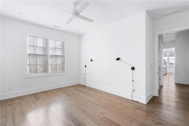 unfurnished room featuring wood-type flooring and ceiling fan