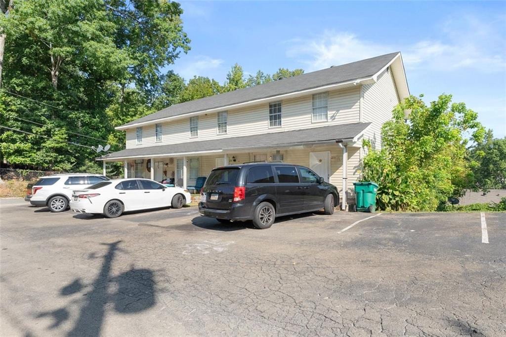 view of front of home with uncovered parking