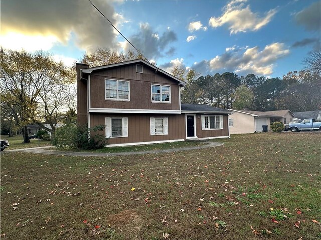 exterior space with a front lawn