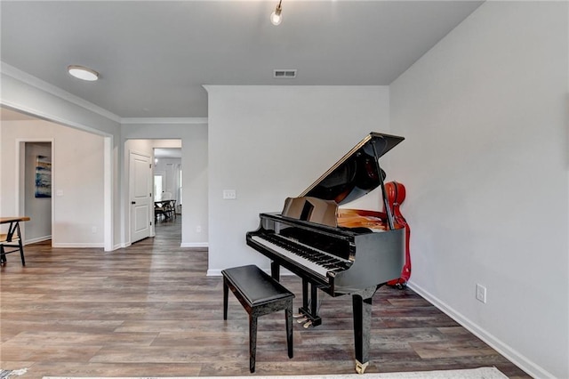 5215 Wheeler Run Dr, Auburn, GA 30011 - living area featuring baseboards, wood finished floors, and crown molding