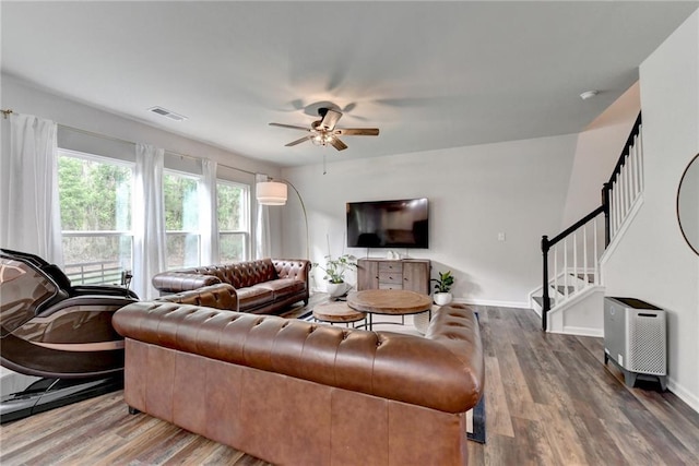 5215 Wheeler Run Dr, Auburn, GA 30011 - living room featuring a ceiling fan, wood finished floors, stairway, and baseboards