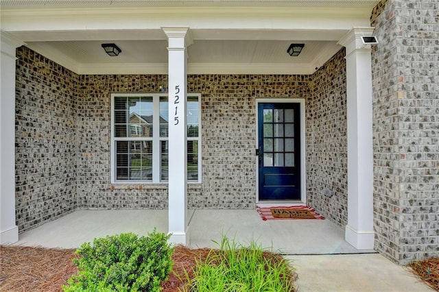 5215 Wheeler Run Dr, Auburn, GA 30011 - entrance to property featuring a porch and brick siding