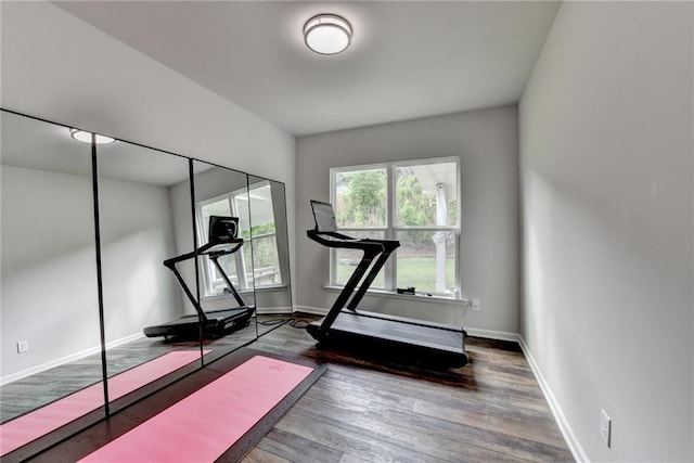 5215 Wheeler Run Dr, Auburn, GA 30011 - workout area with wood finished floors and baseboards