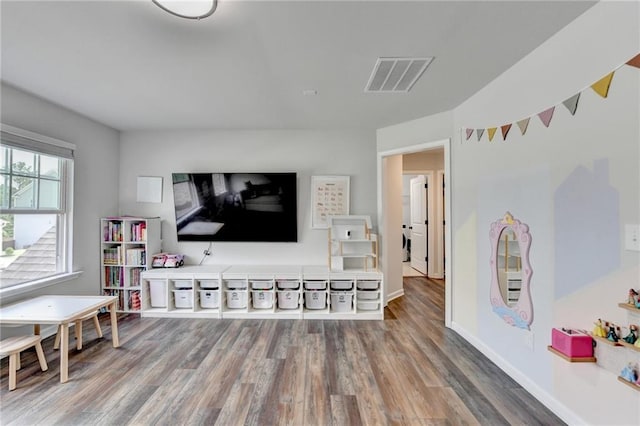 5215 Wheeler Run Dr, Auburn, GA 30011 - playroom featuring wood finished floors and baseboards