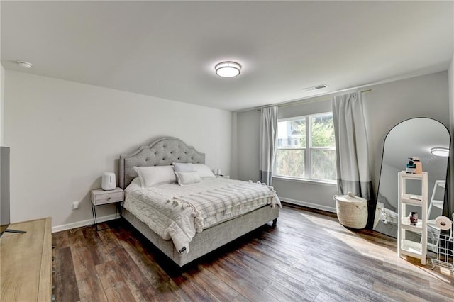 5215 Wheeler Run Dr, Auburn, GA 30011 - bedroom featuring dark wood-style flooring and baseboards