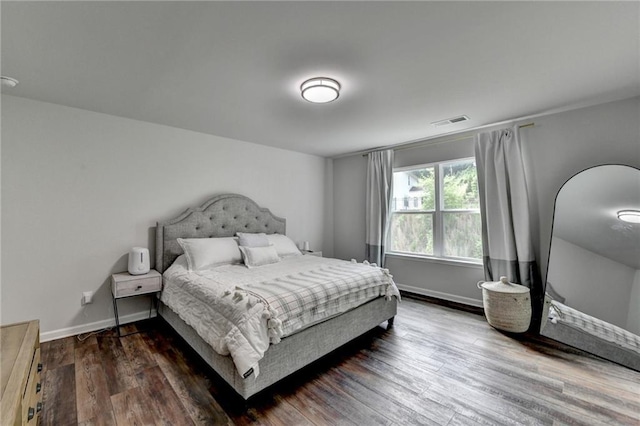 5215 Wheeler Run Dr, Auburn, GA 30011 - bedroom featuring baseboards and wood finished floors