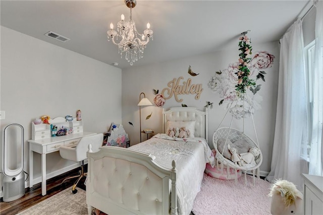 5215 Wheeler Run Dr, Auburn, GA 30011 - bedroom featuring a chandelier, multiple windows, and wood finished floors