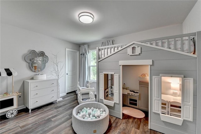 5215 Wheeler Run Dr, Auburn, GA 30011 - bedroom featuring dark wood-style floors