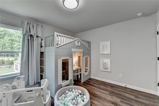 5215 Wheeler Run Dr, Auburn, GA 30011 - bedroom with dark wood finished floors and baseboards