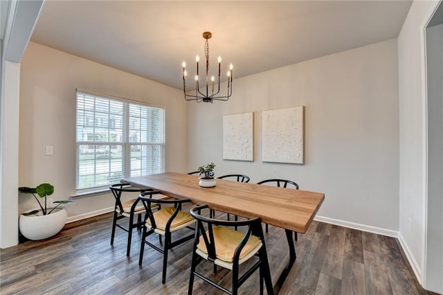 5215 Wheeler Run Dr, Auburn, GA 30011 - dining room featuring a chandelier, baseboards, and dark wood-type flooring