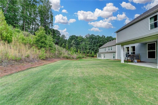 5215 Wheeler Run Dr, Auburn, GA 30011 - view of grassy yard with a patio area