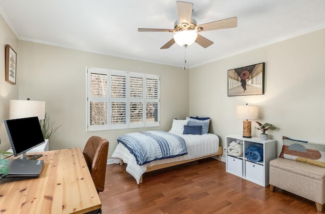 bedroom with wood-type flooring, ornamental molding, and ceiling fan