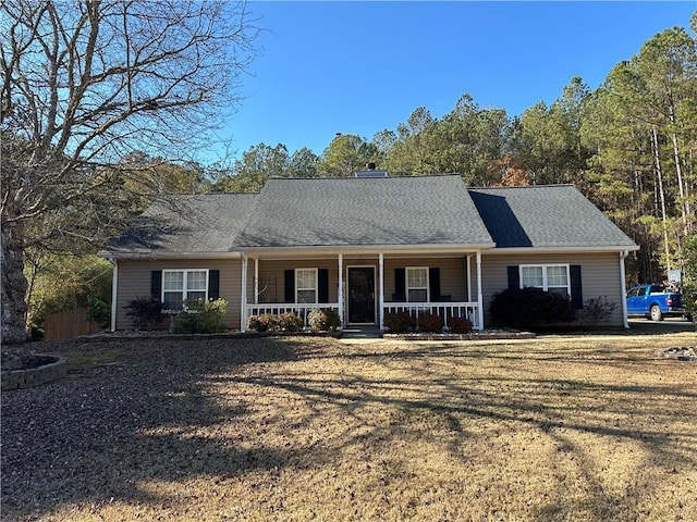 single story home with covered porch