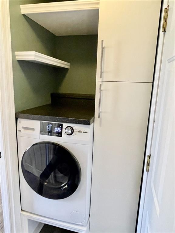 laundry area with washer / clothes dryer