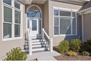 5690 Rutland Trce, Lithonia, GA 30058 - doorway to property featuring stucco siding