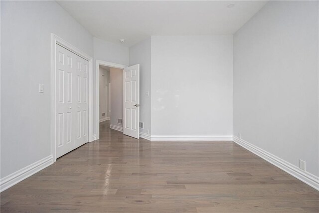 5690 Rutland Trce, Lithonia, GA 30058 - spare room featuring wood finished floors and baseboards