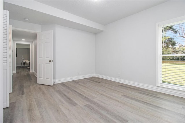 5690 Rutland Trce, Lithonia, GA 30058 - empty room with light wood-style flooring and recessed lighting