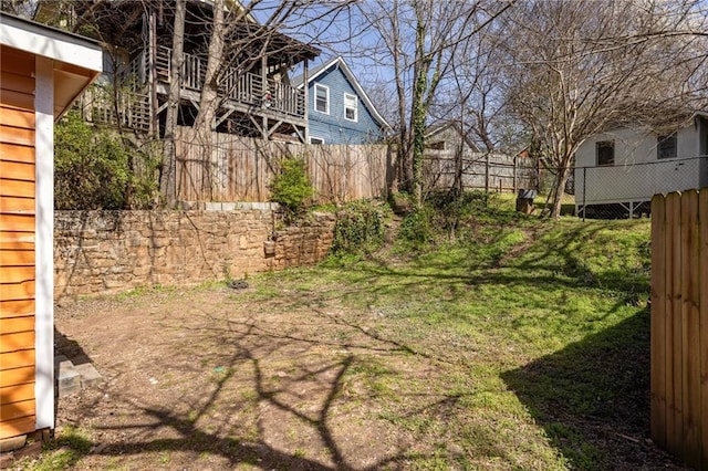 view of yard featuring fence