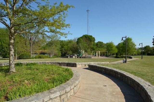 view of home's community with a lawn