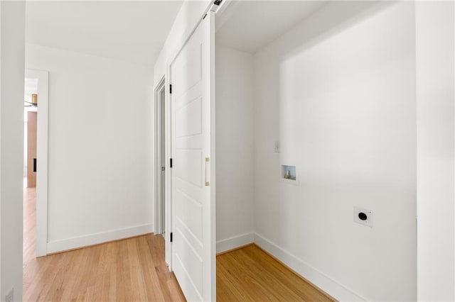 762 Rockbridge Rd NW, Lilburn, GA 30047 - hall featuring light wood-style floors and baseboards