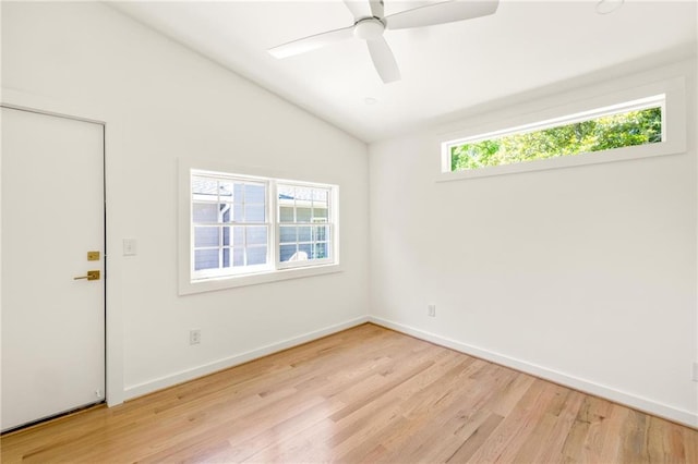 762 Rockbridge Rd NW, Lilburn, GA 30047 - empty room featuring light wood-type flooring, vaulted ceiling, baseboards, and ceiling fan