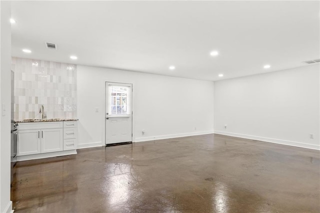 762 Rockbridge Rd NW, Lilburn, GA 30047 - bar area featuring concrete floors, recessed lighting, and baseboards