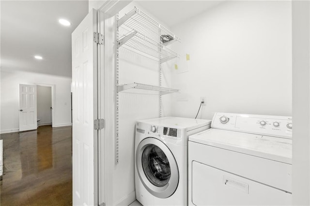 762 Rockbridge Rd NW, Lilburn, GA 30047 - washroom with washing machine and clothes dryer, recessed lighting, and baseboards