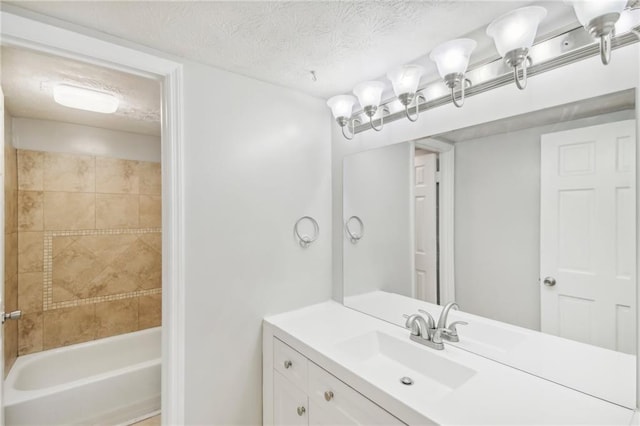 6429 Woodstone Way, Morrow, GA 30260 - full bathroom featuring vanity, shower / bath combination, and a textured ceiling