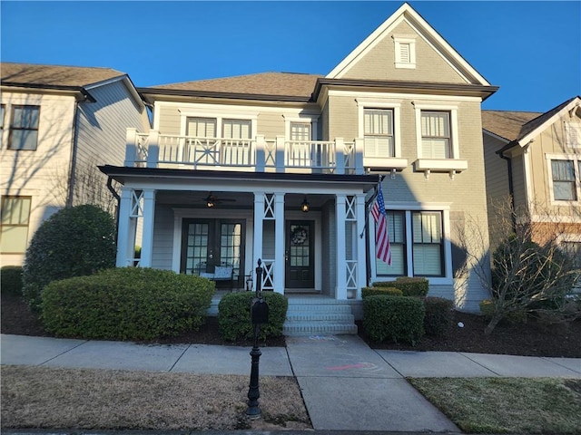 view of front of home featuring a balcony and covered porch