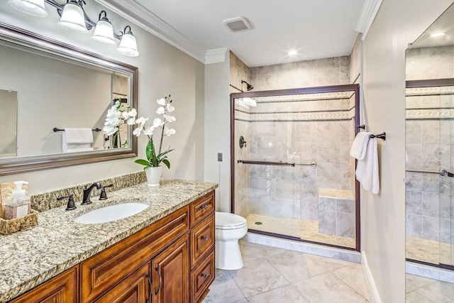 full bath featuring toilet, crown molding, a shower stall, and vanity