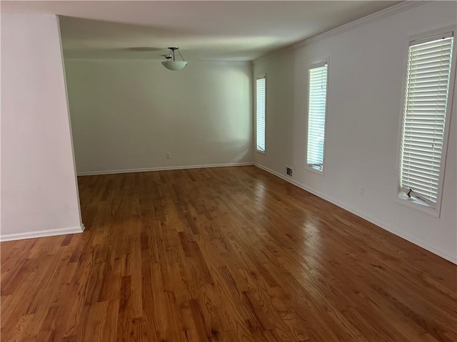 4968 Twin Branches Way, Dunwoody, GA 30338 - unfurnished room featuring wood finished floors and crown molding