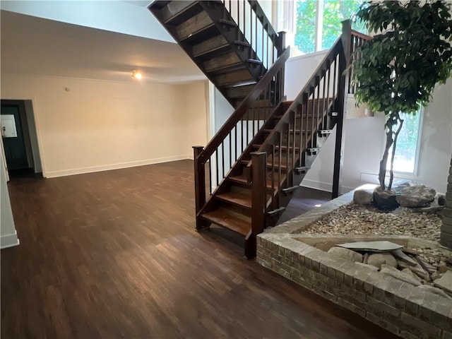 4968 Twin Branches Way, Dunwoody, GA 30338 - staircase featuring wood finished floors and healthy amount of natural light