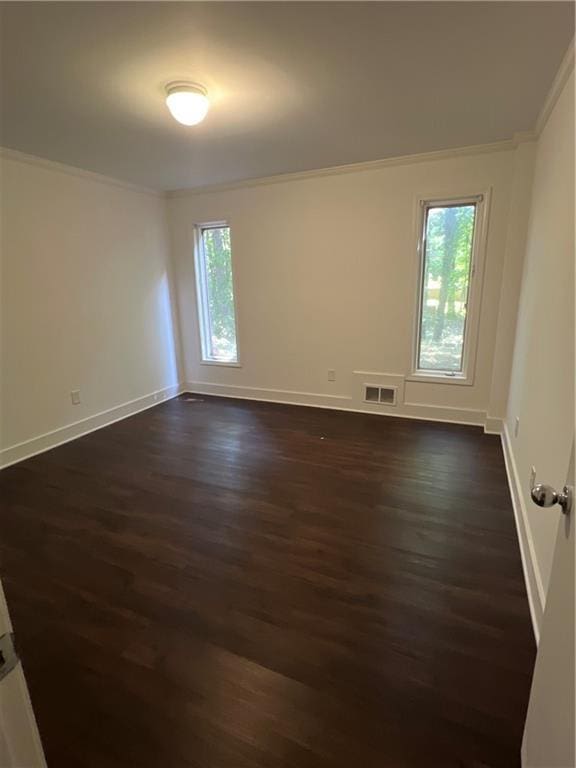 4968 Twin Branches Way, Dunwoody, GA 30338 - empty room with crown molding and dark wood-type flooring