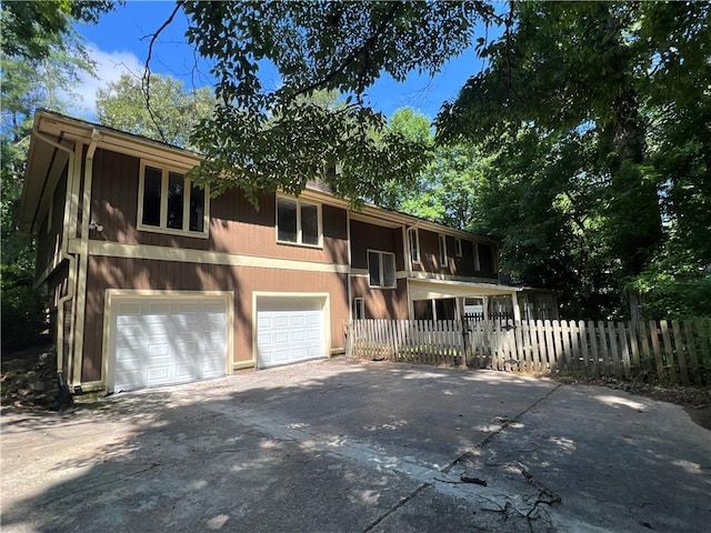 4968 Twin Branches Way, Dunwoody, GA 30338 - bi-level home with a garage and driveway