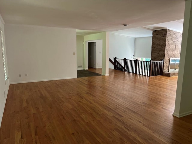 4968 Twin Branches Way, Dunwoody, GA 30338 - empty room with wood finished floors and ornamental molding