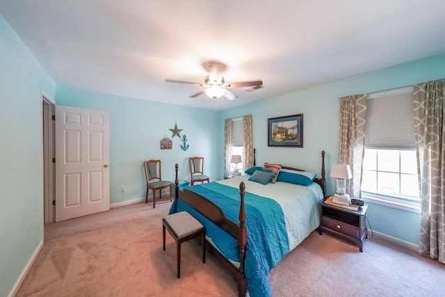bedroom featuring visible vents, carpet flooring, baseboards, and ceiling fan