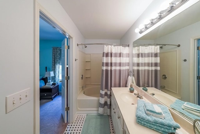 bathroom with vanity and shower / tub combo with curtain