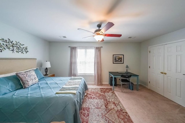 bedroom featuring baseboards, ceiling fan, light carpet, and visible vents