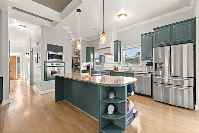 1797 Olive St SE, Atlanta, GA 30315 - kitchen with appliances with stainless steel finishes, open shelves, crown molding, light wood-type flooring, and light stone counters