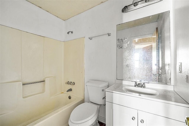 bathroom featuring toilet, vanity, and shower / bath combination