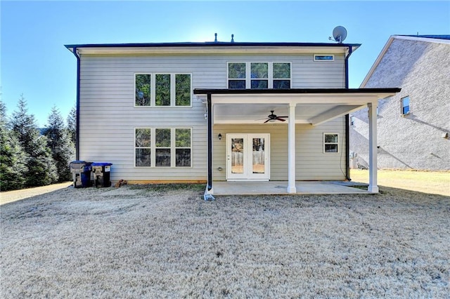 view of front facade with ceiling fan, french doors, and a patio area